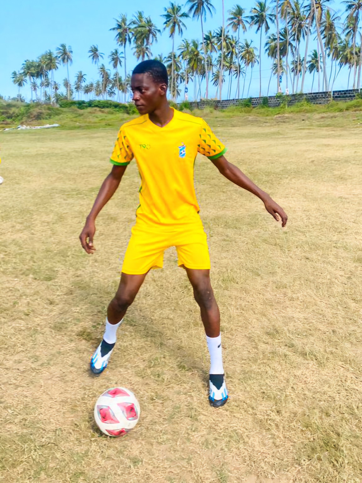 Mujab playing football in Ghana